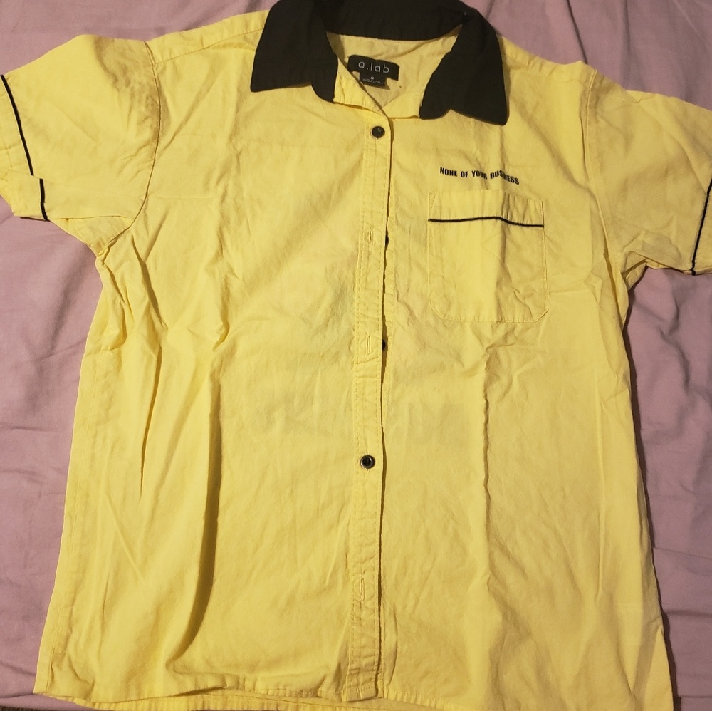 yellow button up shirt